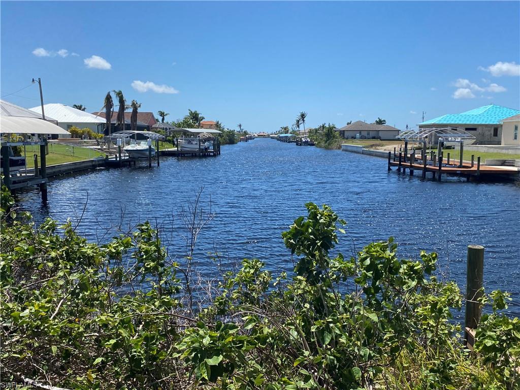 Image 1: Water view with a boat dock