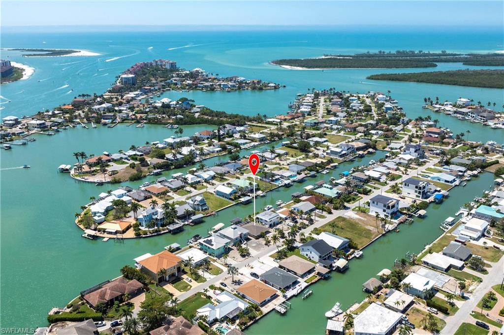 Image 2: Birds eye view of property featuring a residential view and a water view