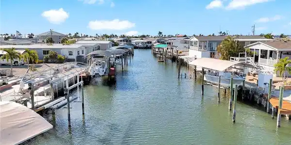 Image 2: High-altitude aerial view of Cherry Estates and the nearby waterways of beautiful St. James City.