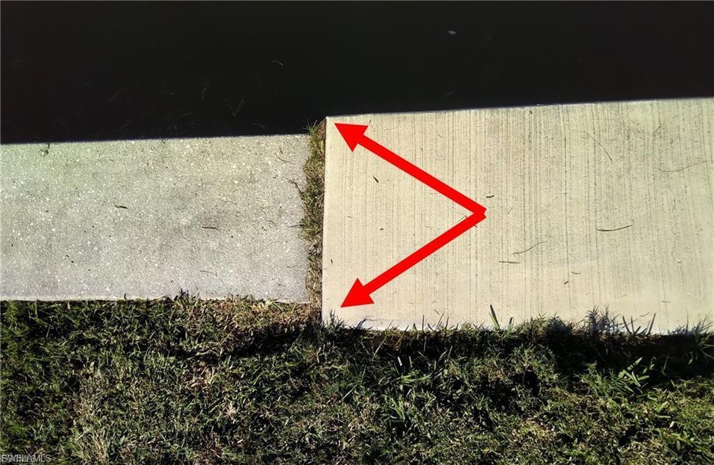 Image 4: New upgraded hurricane code seawall with larger cement cap.