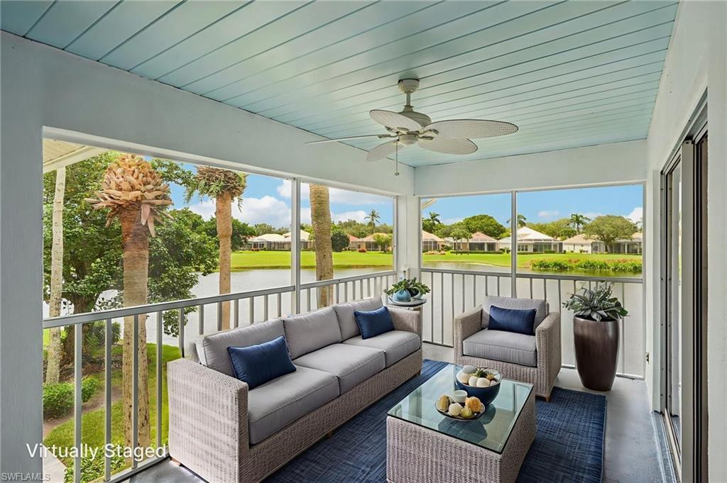 Image 4: Sunroom featuring a ceiling fan, outdoor lounge area, a residential view, and a water view