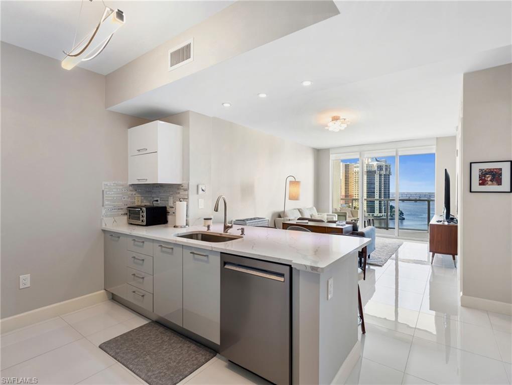 Image 2: Unit 1206 kitchen and living room
