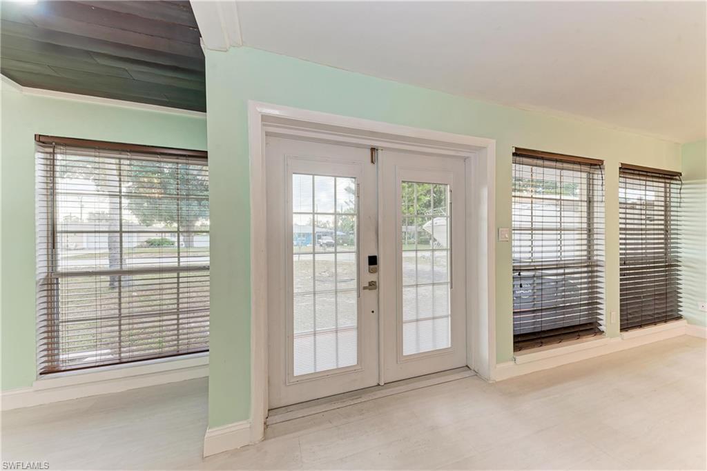 Image 4: Entryway with french doors and baseboards