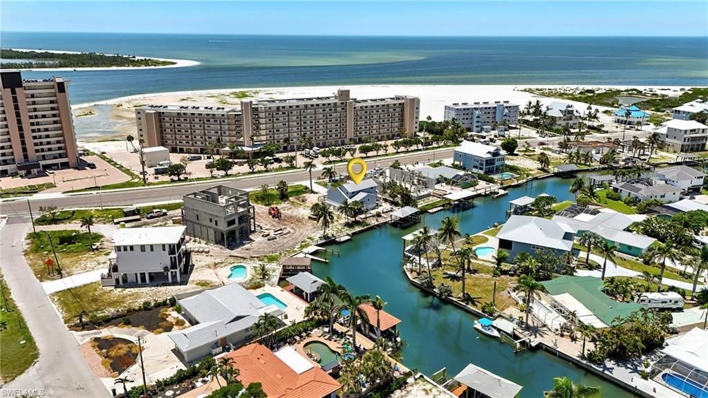 Image 1: Bird's eye view of a large body of water and apartment complex / building - Virtually Edited Image