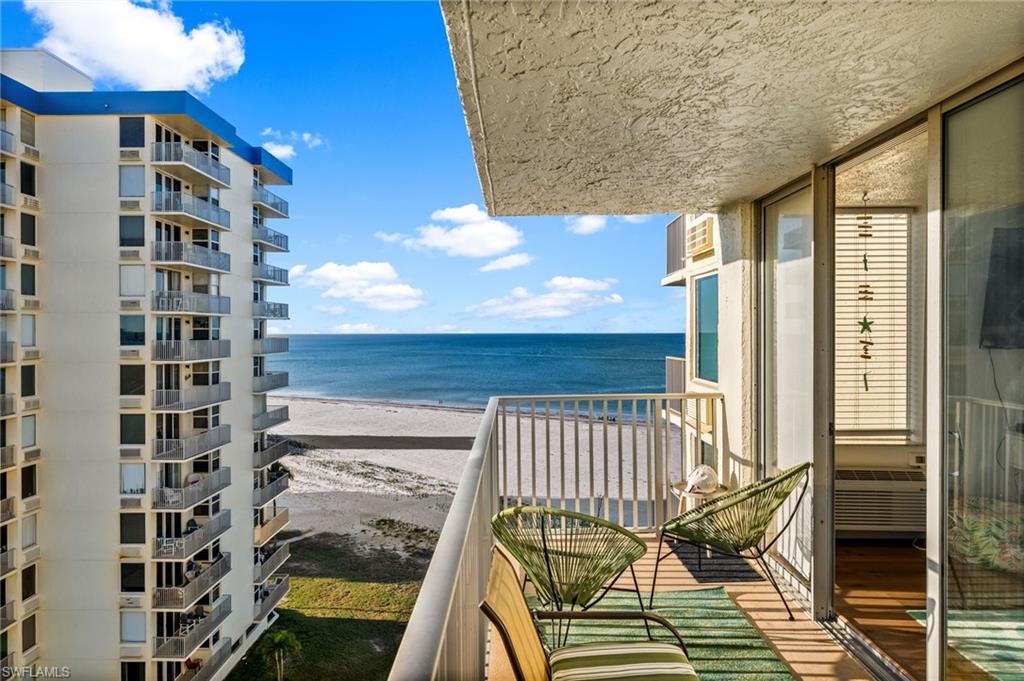 Image 1: Balcony with view of  Gulf water and beach
