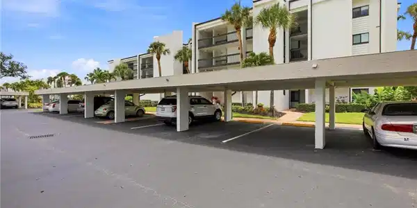 Image 2: Covered parking facility with multiple spaces