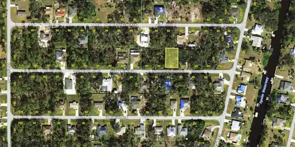 Image 2: Aerial overview of property's location with property boundaries highlighted