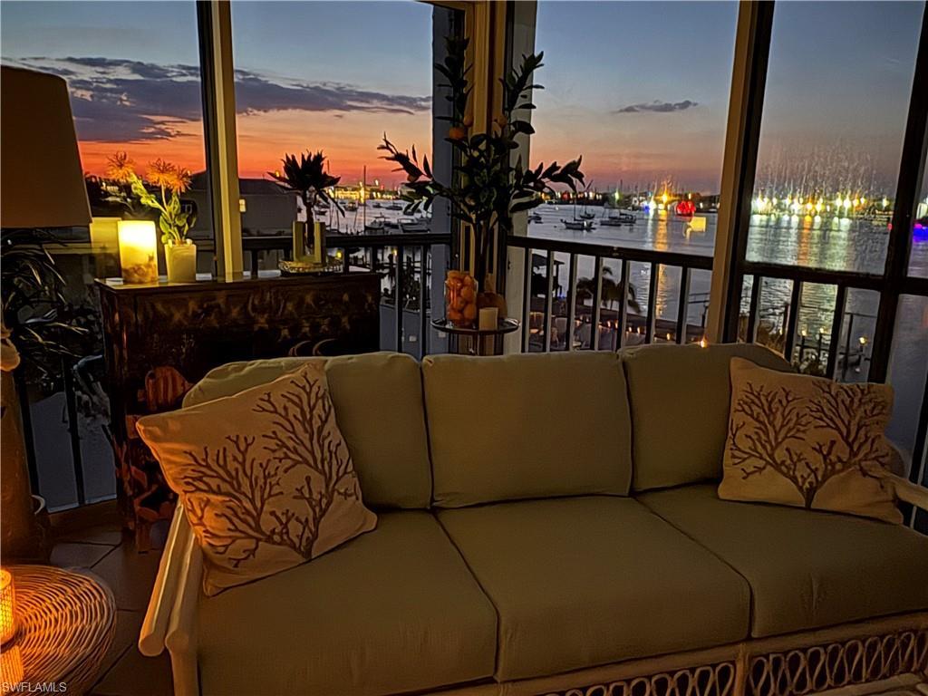 Image 2: Sunset from your Lanai and the lights across the Bay!