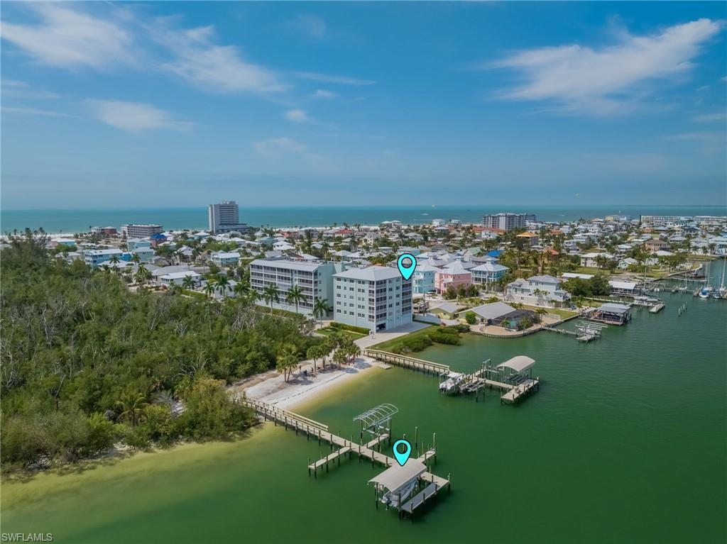 Image 3: Bayfront 4th floor condo with a deeded dock, lift and boat cover.