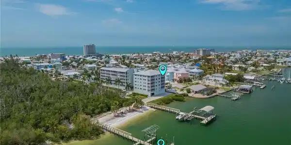 Image 3: Bayfront 4th floor condo with a deeded dock, lift and boat cover.