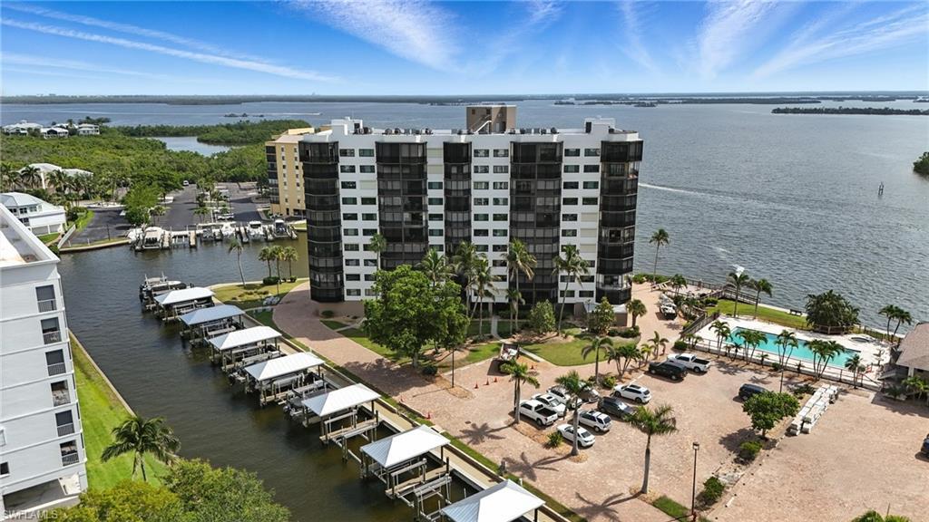 Image 3: Bird's eye view of apartment complex / building and a large body of water