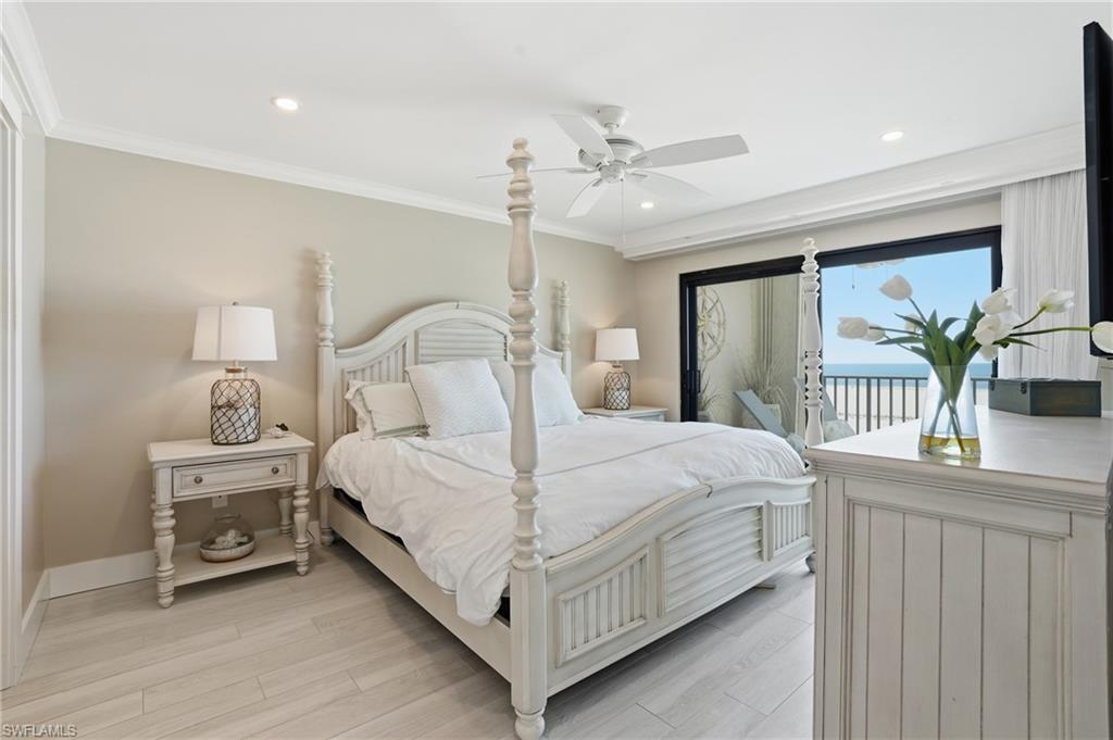 Image 4: Primary bedroom with Gulf views -virtually enhanced