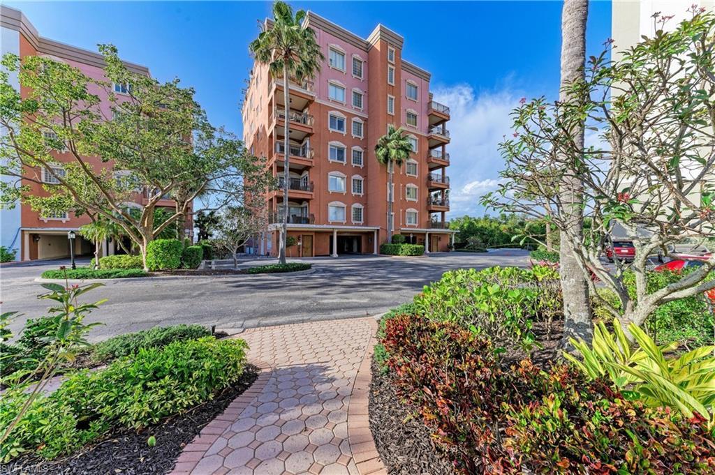 Image 1: View of apartment building / complex