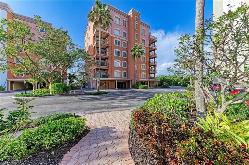 Image 1: View of apartment building / complex