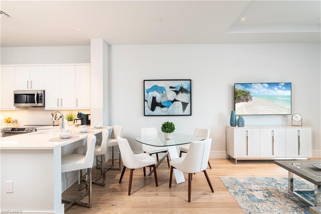 Image 1: Open floor plan dining|living