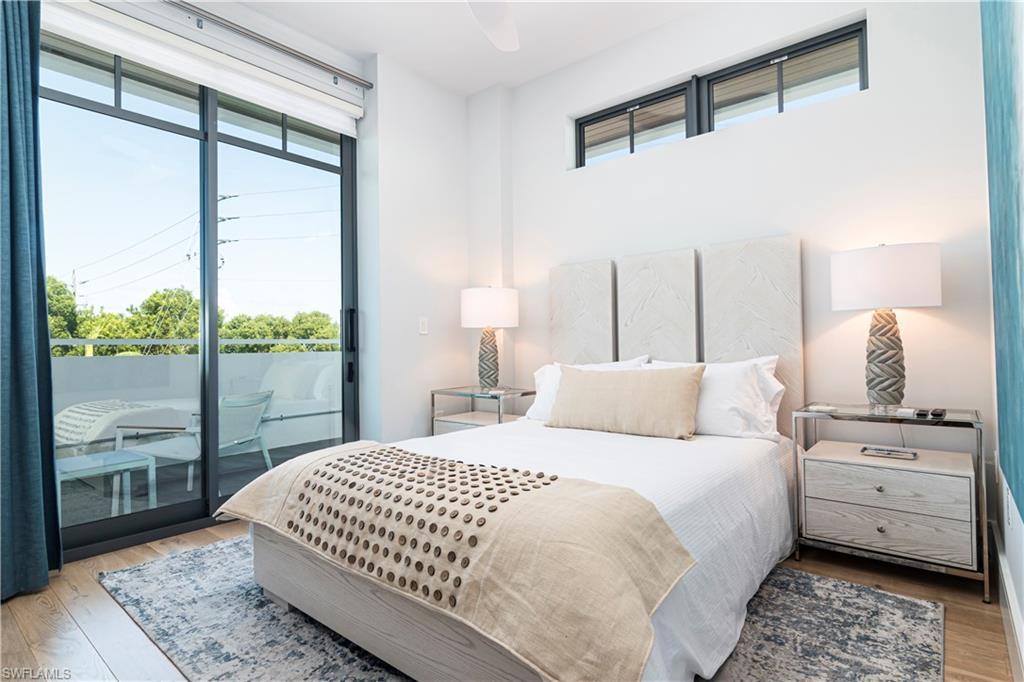Image 3: Bedroom 1 with sunset view balcony