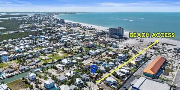 Image 2: Direct Beach Access, Can't beat that! Drone / aerial view with Beach Access  - Virtually Edited Exterior Image