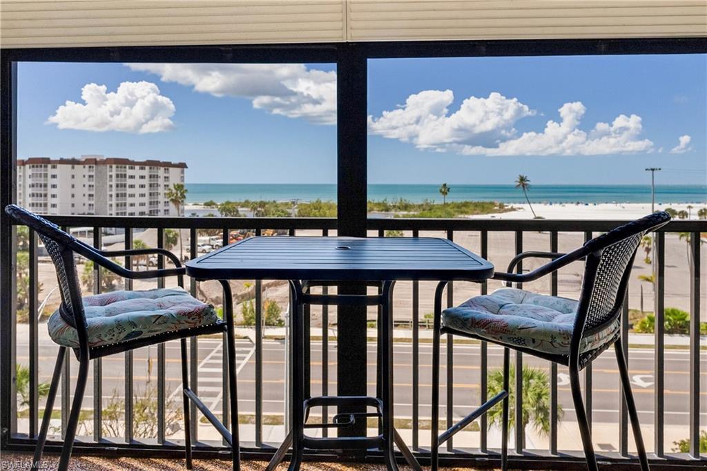 Image 1: Balcony with a water view