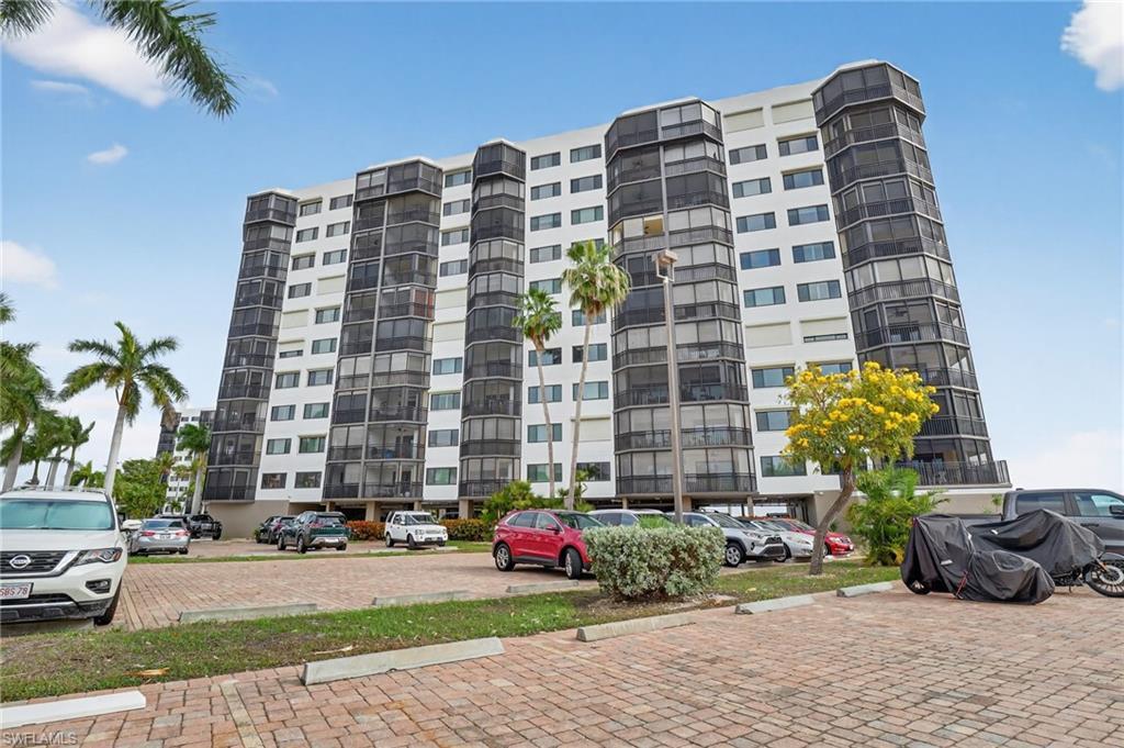 Image 1: View of apartment building / complex