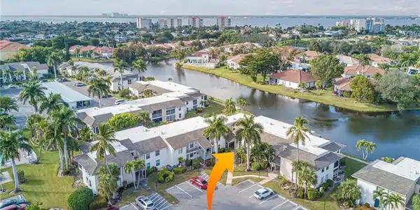 Image 3: View of urban area featuring a nearby body of water and nearby suburban area