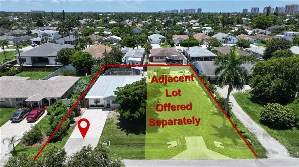 Image 1: Single-story residence featuring a paved driveway, mature landscaping, and a screened rear patio
