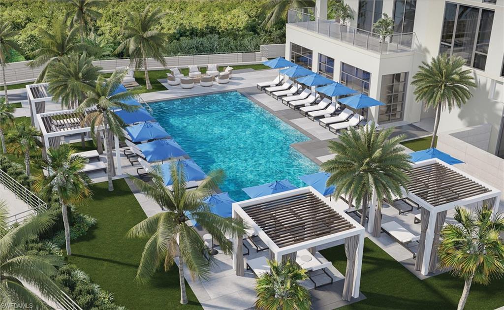 Image 1: Community pool with a patio