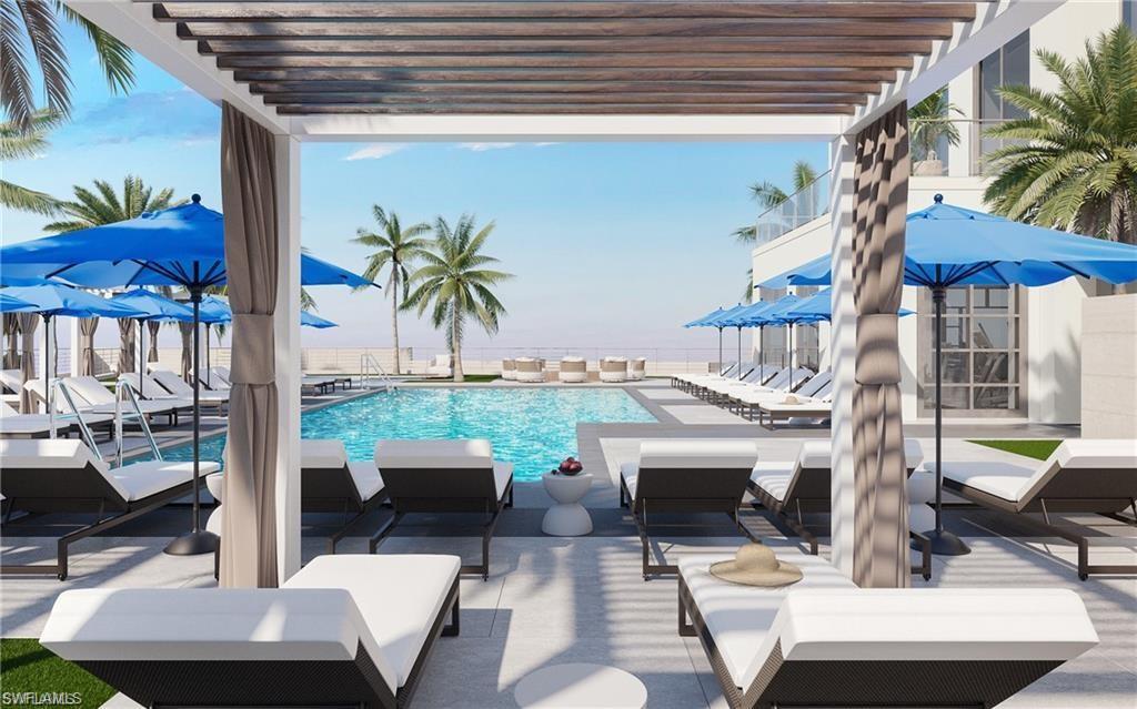 Image 2: Community pool featuring a pergola, outdoor lounge area, and a patio