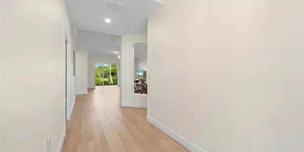 Image 3: Inviting entry into the renovated 1st floor residence.