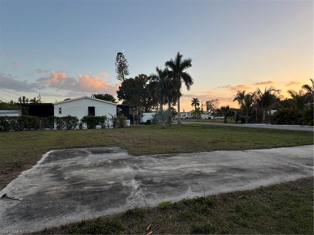 Image 3: View of grassy yard