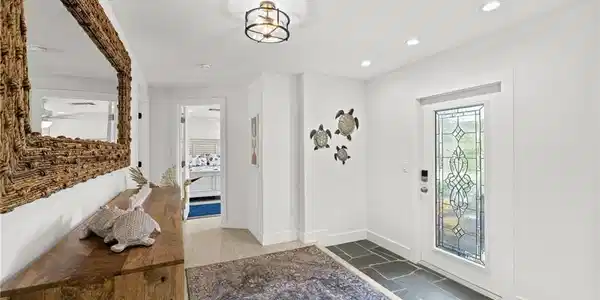 Image 3: Entryway with baseboards and recessed lighting