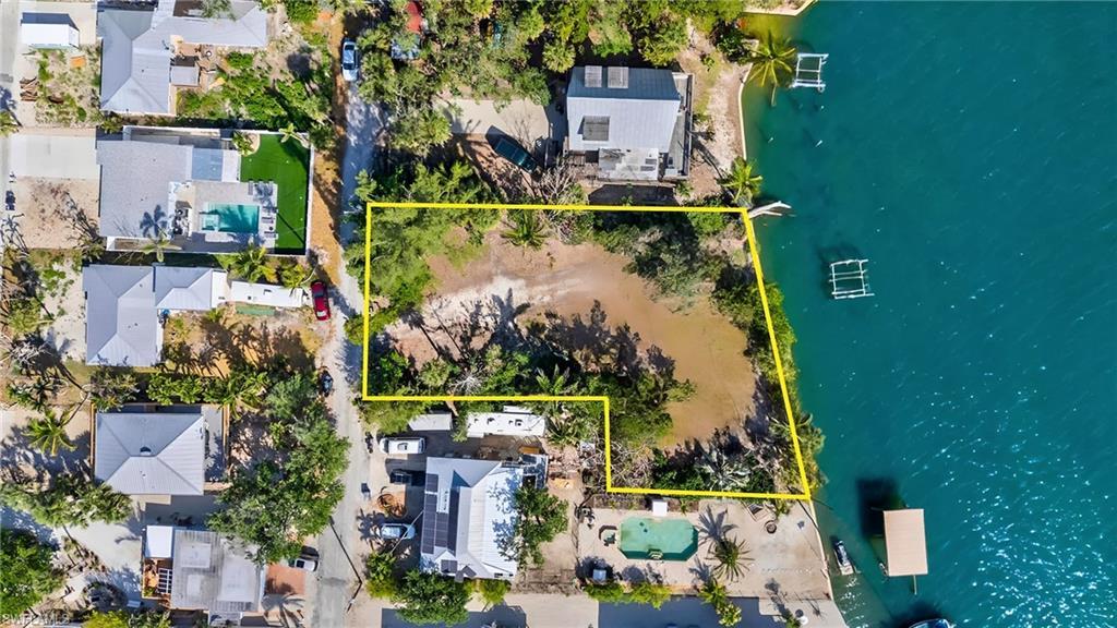 Image 1: 165 Feet of Seawall and a view that is second to none!  Virtually Edited Property Lines