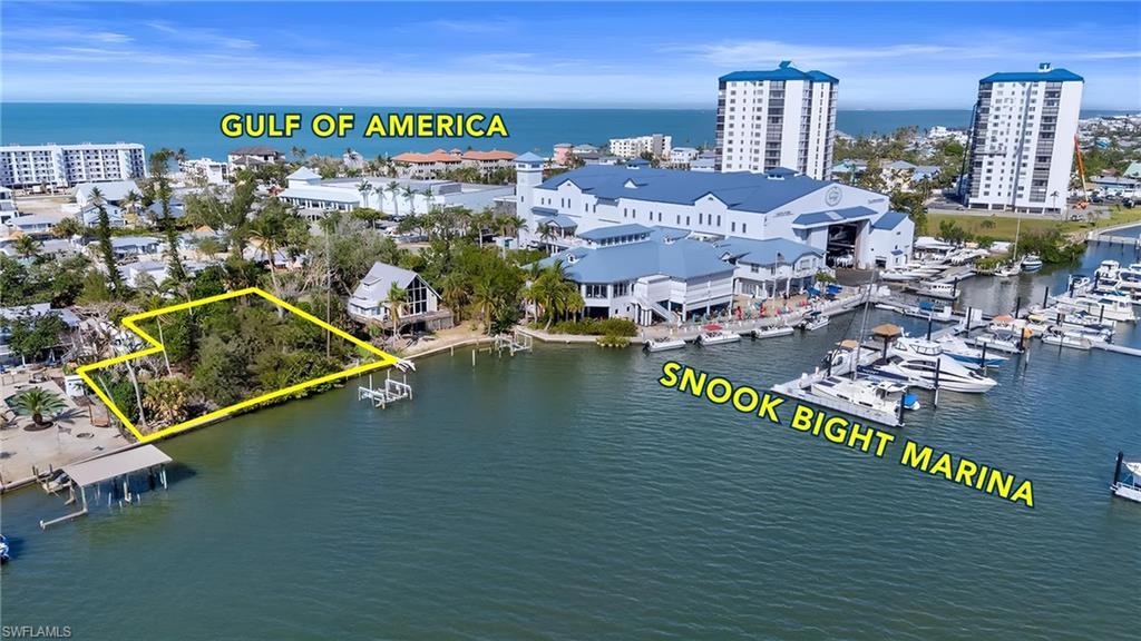 Image 3: Talk about convenience!  Close to the Marina with restaurants, great Bay Access and just steps to the Gulf of America.  Virtually Edited Property Lines