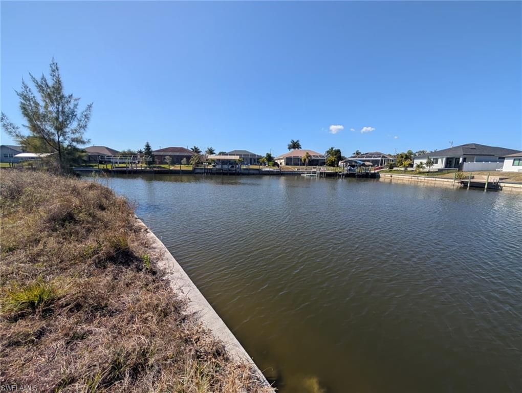 Image 1: Water view with nearby suburban area