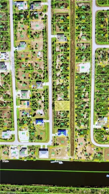 Image 2: Aerial map of property and surrounding area featuring property parcel outlined