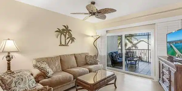 Image 3: Living room featuring ceiling fan and wood finished floors