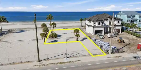 Image 2: Beachfront property with direct access to the sand and ocean - Virtually Edited Image