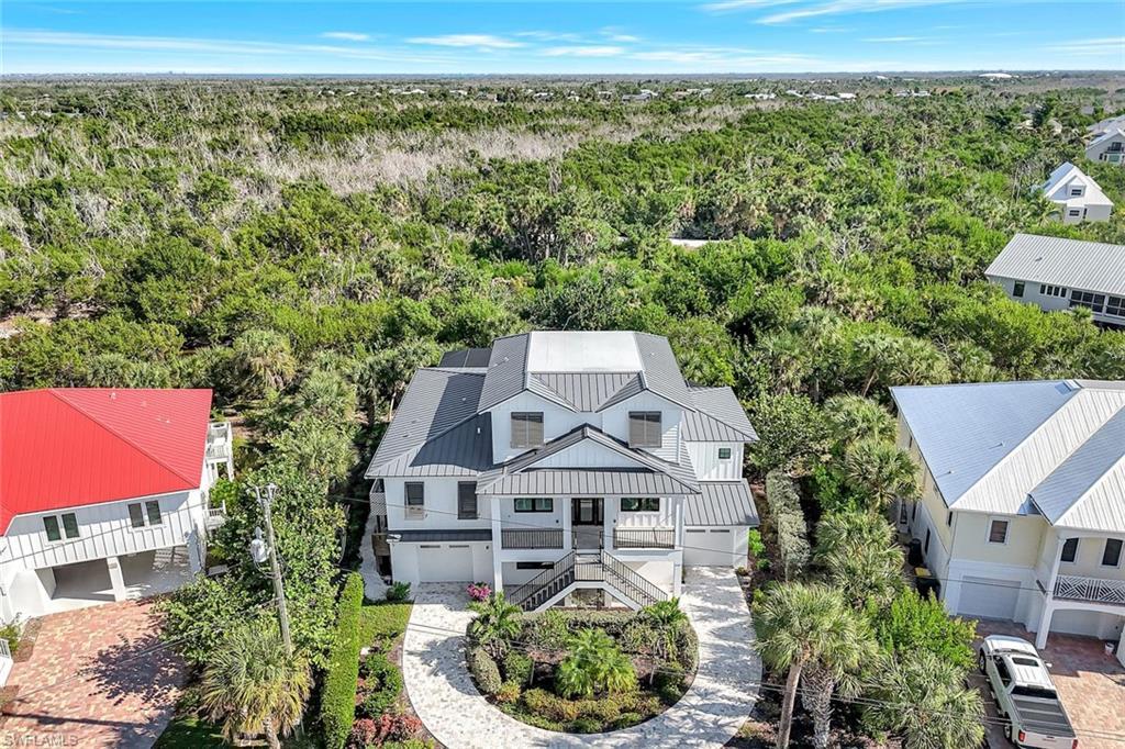 Image 3: Aerial view of property and surrounding area