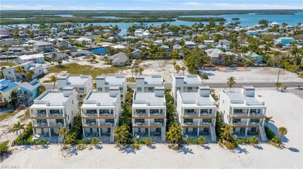 Image 1: Virtual concept image &ndash; example of potential site development with elevated Gulf-front homes and pools.