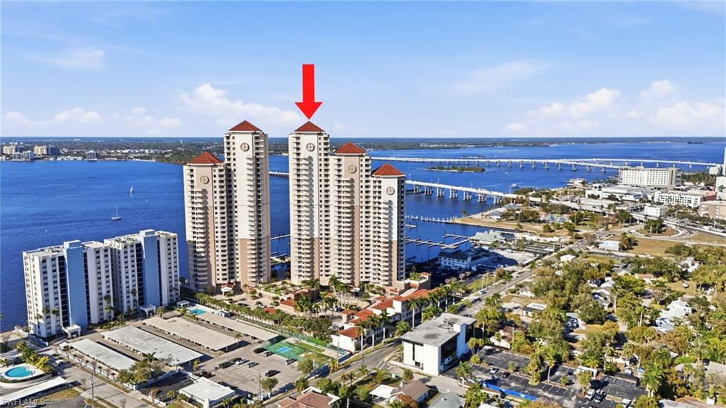 Image 4: Highlight of building exterior with a water view