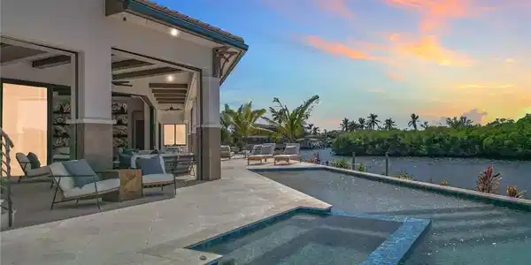 Image 4: Very private back yard.  The pool has a large shallow area and built in spa.