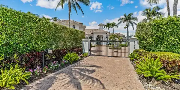 Image 2: Gate with a fenced front yard