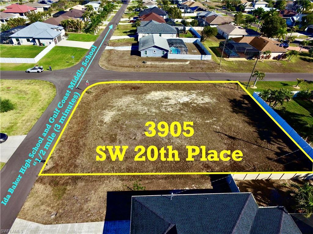 Image 1: Aerial perspective of suburban area with property parcel outlined