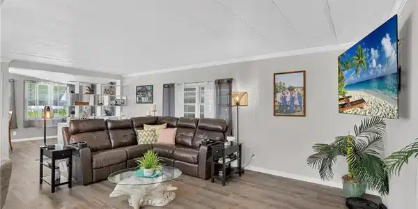 Image 4: Wood-finish flooring throughout the space