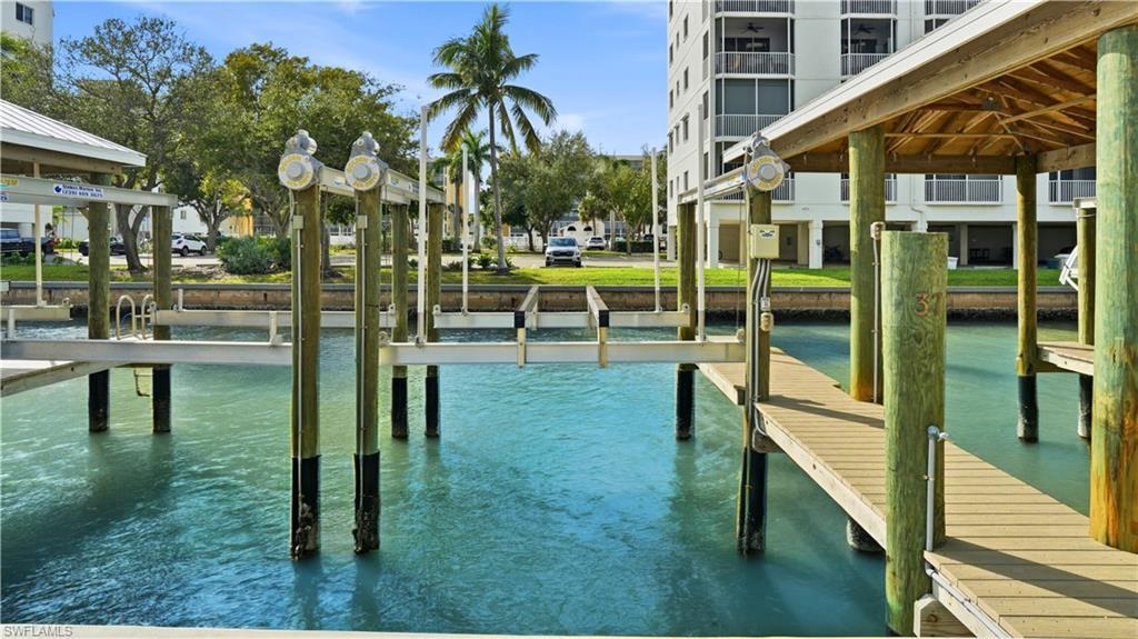 Image 2: Boater's Dream with Luxury Condo Lifestyle. Includes your own boat dock/life with this unit, just steps to get there. Dock #37 on canal to get  Estero Bay within minutes- Virtually Edited Image