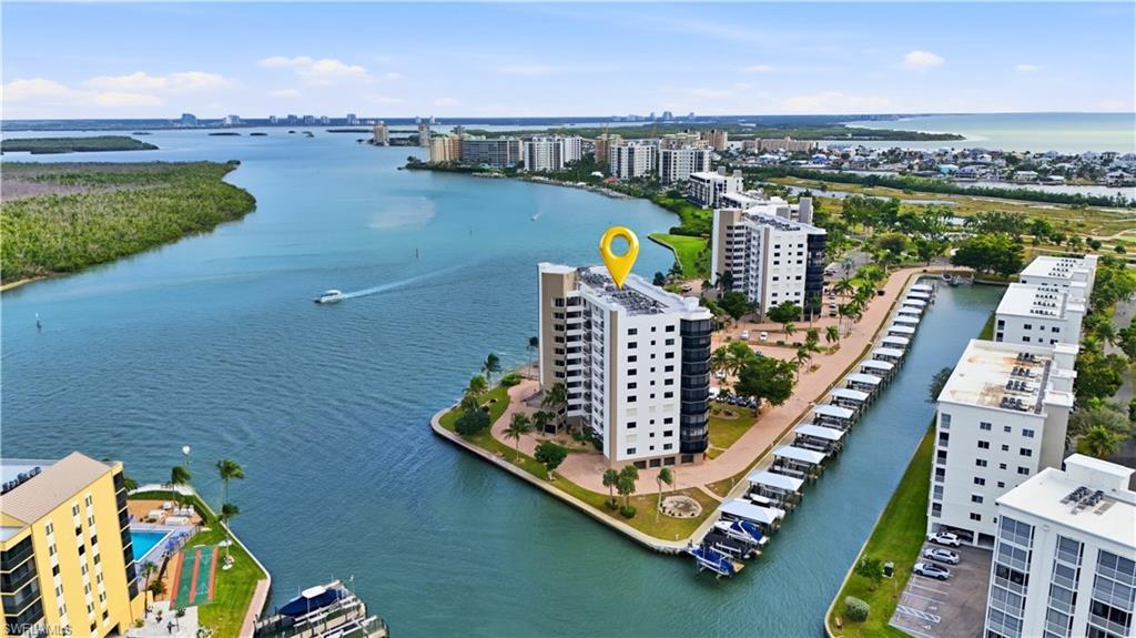 Image 3: View of Harbour Pointe with canal and Boat Docks/Lifts and Estero Bay - Virtually Edited Image