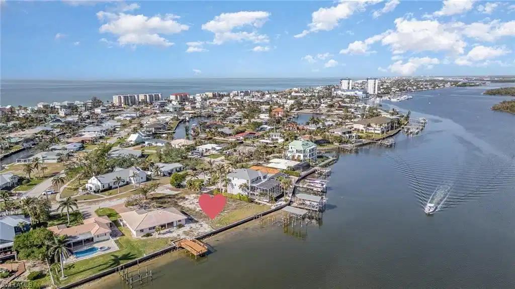 Image 1: Spectacular oversized bayfront homesite&mdash;spanning over one-third of an acre&mdash;one of the highest elevations on the island and gracing the Estero Bay Estuary just moments from the sparkling Gulf waters and the sugar-white sands of Fort Myers Beach.