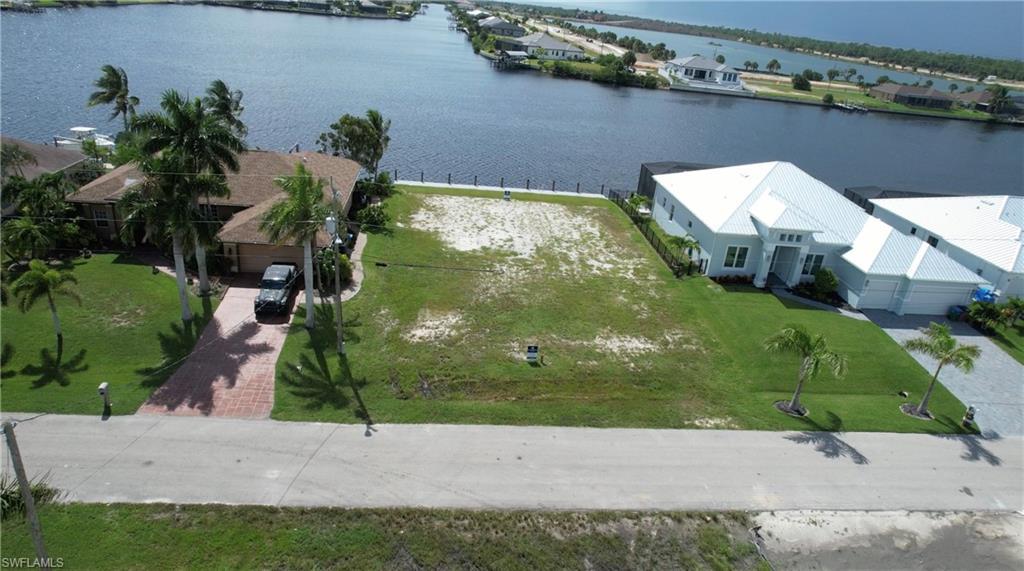 Image 3: Birds eye view of property with a water view