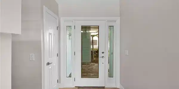 Image 4: Entryway featuring light wood finished floors and baseboards