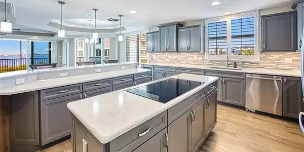 Image 3: Gorgeous remodeled kitchen with island, cooktop and great view