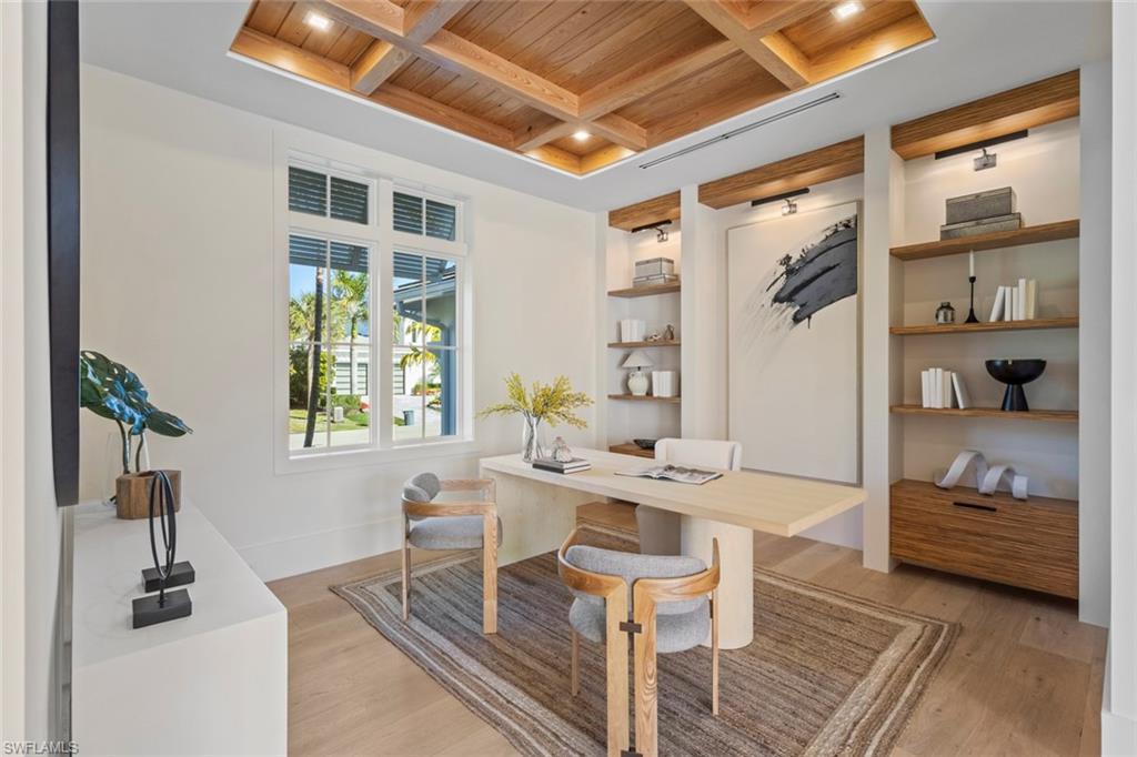 Image 4: Office featuring a wood ceiling with exposed beams, coffered ceiling, light wood-type flooring, and recessed lighting
